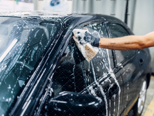 demo-attachment-1002-op_carwash-service-worker-soaps-glasses-A26XTPJ